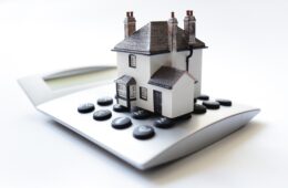 Mortgage calculator House on calculator concept for mortgage calculator, home finance or saving for a house loan